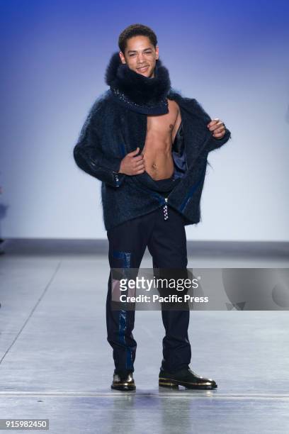Jeremy Carver wearing jacket by Son Jung Wan walks runway for Blue Jacket Fashion Show to benefit Prostate Cancer Foundation at Pier 59.
