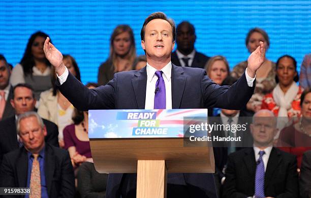 In this handout image supplied by the Conservative Party, David Cameron, leader of the Conservative Party, delivers his keynote speech to delegates...