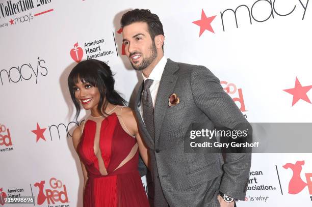 Personalities Rachel Lindsay and Bryan Abasolo attend the Red Dress / Go Red For Women Fashion Show at Hammerstein Ballroom on February 8, 2018 in...