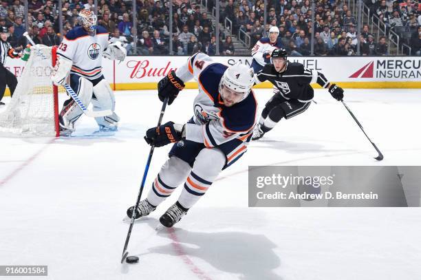 Kris Russell of the Edmonton Oilers handles the puck during a game against the Los Angeles Kings at STAPLES Center on February 7, 2018 in Los...