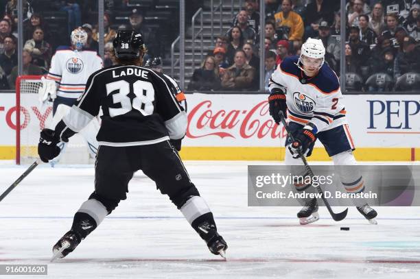 Andrej Sekera of the Edmonton Oilers handles the puck during a game against the Los Angeles Kings at STAPLES Center on February 7, 2018 in Los...