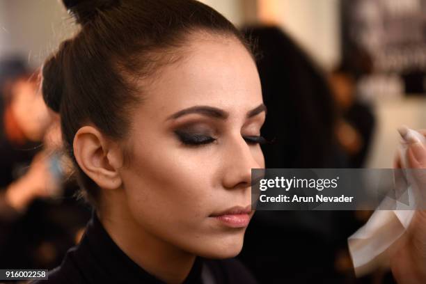 Model prepares backstage at New York Fashion Week Powered by Art Hearts Fashion NYFW at The Angel Orensanz Foundation on February 8, 2018 in New York...
