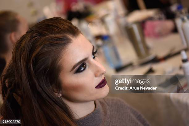 Model prepares backstage at New York Fashion Week Powered by Art Hearts Fashion NYFW at The Angel Orensanz Foundation on February 8, 2018 in New York...