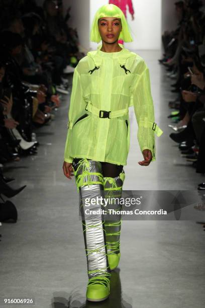 Jourdan Dunn walks the runway wearing Jeremy Scott Fall 2018 with make up by Kabuki for MAC and hair by Eugene Souleiman for Wella at Spring Studios...