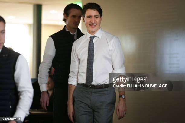Canadian Prime Minister Justin Trudeau speaks with AppDirect employees in the comany offices as part of his three-day United States tour February 8...