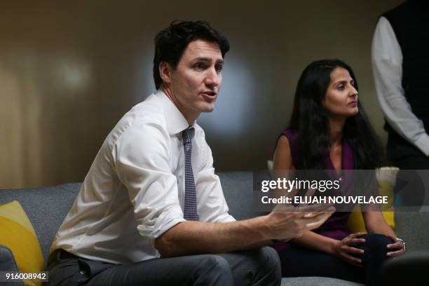 Canadian Prime Minister Justin Trudeau speaks with AppDirect employees in the comany offices as part of his three-day United States tour February 8...