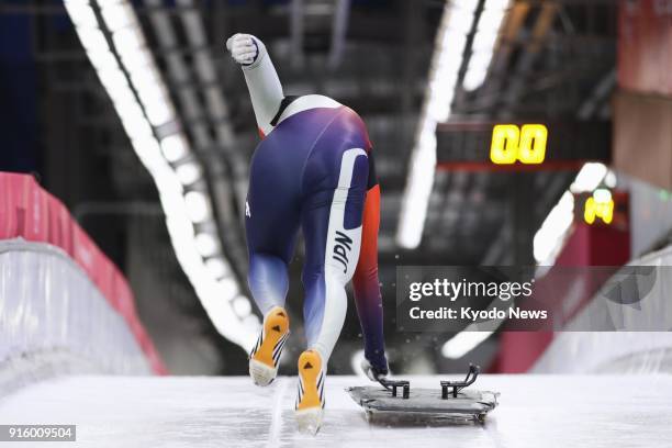 Japanese skeleton racer sprints with his sled on the course for the Winter Olympics in Pyeongchang, South Korea, on Feb. 7, 2018. ==Kyodo