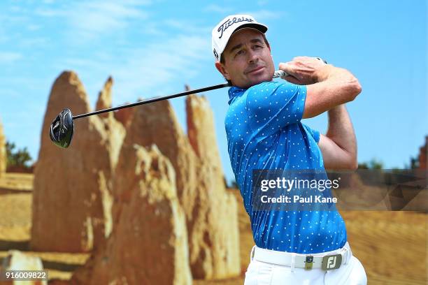 Brett Rumford of Australia watches his tee shot on the 6th hole during day two of the World Super 6 at Lake Karrinyup Country Club on February 9,...