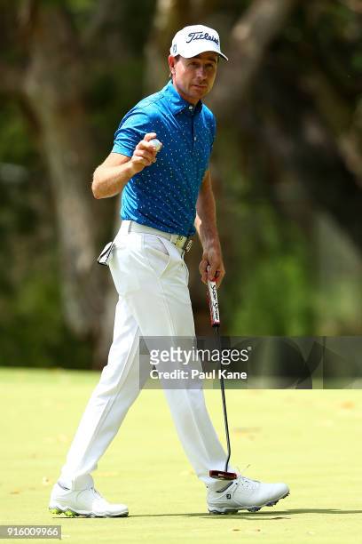 Brett Rumford of Australia acknowledges the gallery on the 3rd green during day two of the World Super 6 at Lake Karrinyup Country Club on February...