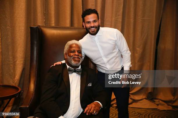 Earl Campbell and José Altuve pose backstage during the Houston Sports Awards on February 8, 2018 in Houston, Texas.