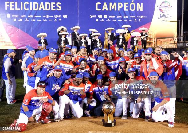 Puerto Rico's players of Criollos de Caguas celebrate with the trophy after the final of the Caribbean Baseball Series at the Charros Jalisco stadium...
