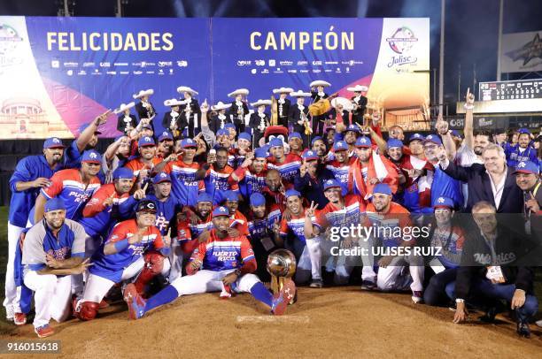 Puerto Rico's Luis Matos of Criollos de Caguas celebrate with the trophy after the final of Caribbean Baseball Serie at the Charros Jalisco stadium...