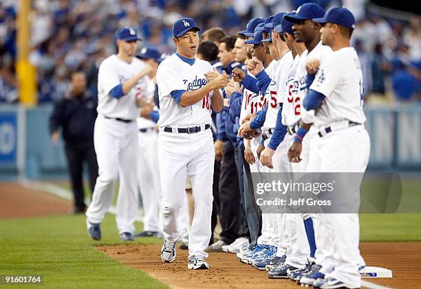 Pitcher Hiroki Kuroda of the Los Angeles Dodgers is introduced during player introductions before taking on the St. Louis Cardinals in Game One of...