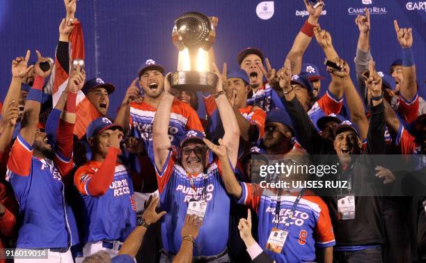 Puerto Rico's Luis Matos of Criollos de Caguas celebrate with the trophy after the final of Caribbean Baseball Serie at the Charros Jalisco stadium...