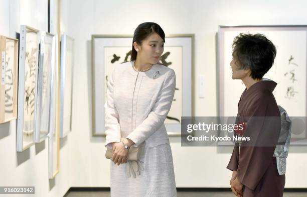 Japanese Princess Mako, the eldest granddaughter of Emperor Akihito, visits a calligraphy exhibition in Tokyo on Feb. 9 in her first official duty...