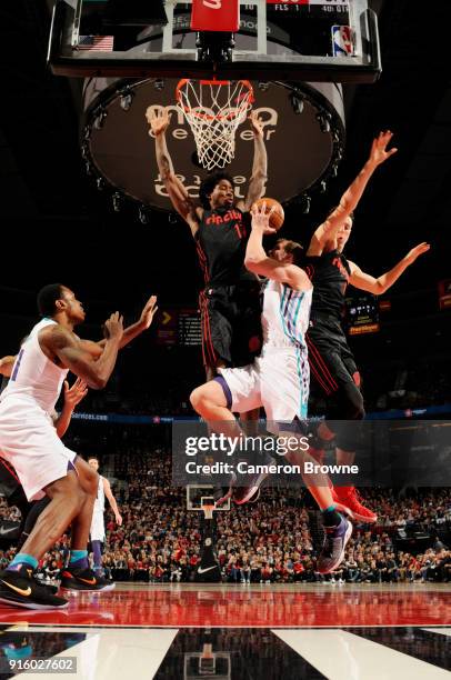 Cody Zeller of the Charlotte Hornets goes to the basket against Ed Davis of the Portland Trail Blazers on February 8, 2018 at the Moda Center in...