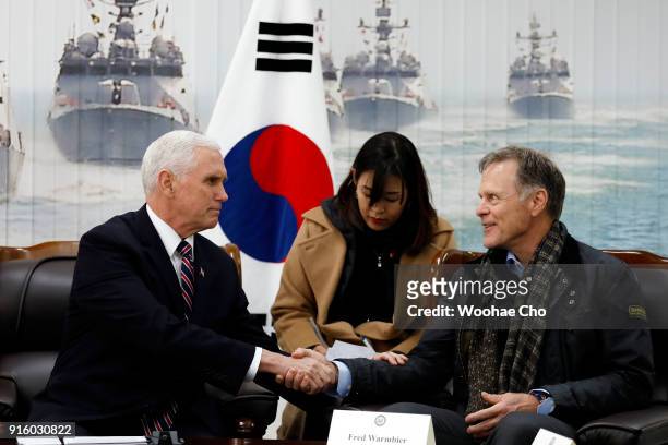 Pyeongtaek, SOUTH KOREA U.S. Vice President Mike Pence shakes hands with Fred Warmbier, the father of Otto warmbier who was imprisoned in North Korea...