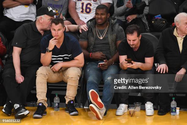 Baseball players Joc Pederson and Yasiel Puig attend a basketball game between the Los Angeles Lakers and the Oklahoma City Thunder at Staples Center...