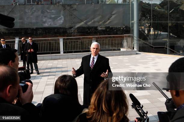 Vice President Mike Pence talks to the media in front of damaged South Korean Navy corvette ROKS Cheonan which was sunk by a North Korean torpedo off...