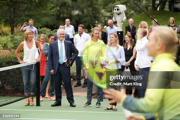 The Prime Minister of Australia Malcolm Turnbull looks on as the Australia and Ukraine teams have a hit of tennis during a Prime Minister's reception...