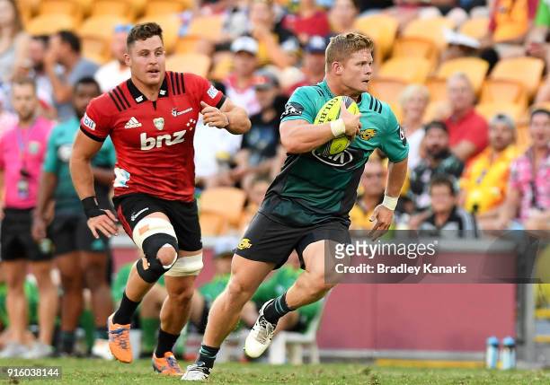 James O'Reilly of the Hurricanes breaks away from the defence during the 2018 Global Tens match between the Hurricanes and the Crusaders at Suncorp...