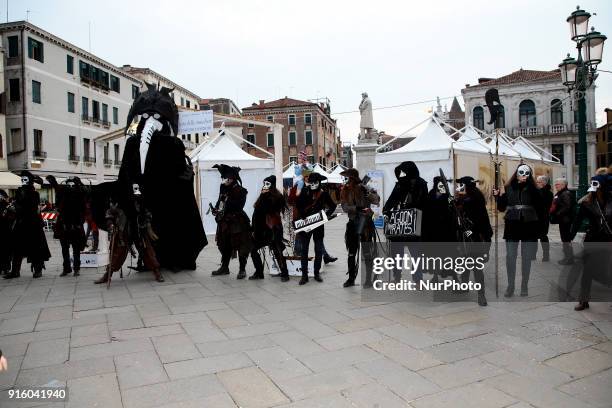 Dancers wearing traditional costumes attend at the traditional events of Carnival 'Cutting off the Bull's head' and 'Dance of the Masks' on February...