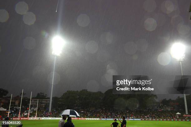 General view is seen of the empty playing field after play was halted at quarter time due to the weather conditions during the round 20 AFLW match...
