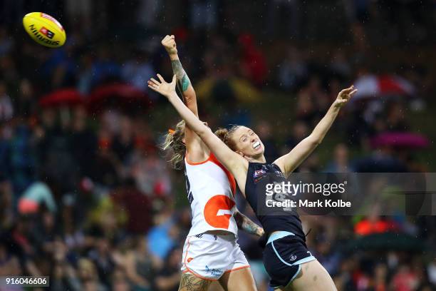 Phoebe Monahan of the Giants and Kate Shierlaw of the Blues compete for the ball during the round 20 AFLW match between the Greater Western Sydney...