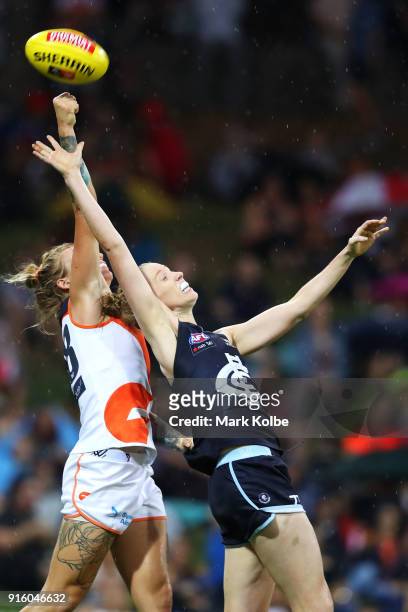 Phoebe Monahan of the Giants and Kate Shierlaw of the Blues compete for the ball during the round 20 AFLW match between the Greater Western Sydney...