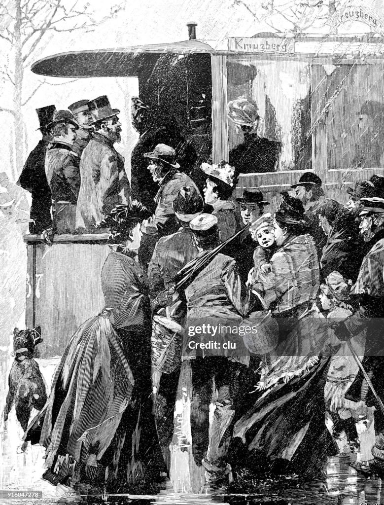 People in bad weather want to take the tram