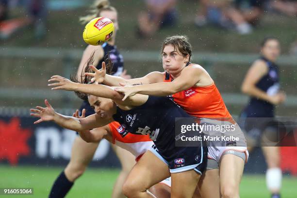 Jacinda Barclay of the Giants and Lauren Brazzale of the Blues compete for the ball during the round 20 AFLW match between the Greater Western Sydney...