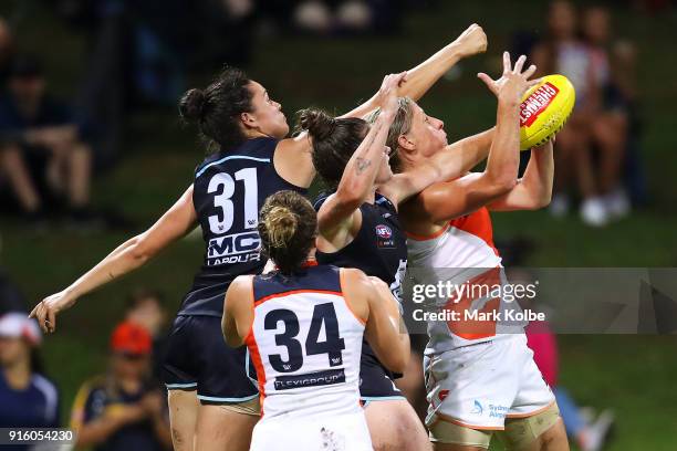 Cora Staunton of the Giants wins the ball under pressure from the Blues defence during the round 20 AFLW match between the Greater Western Sydney...