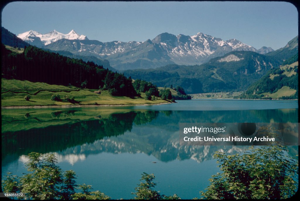 Reflection of Kaisershuhl Mountains in Lake Lungern, Obwalden, Switzerland, 1964
