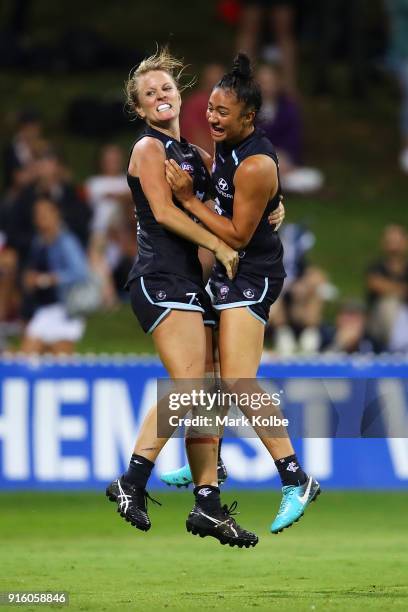 Katie Loynes of the Blues celebrates with Darcy Vescio of the Blues after scoring a goal during the round 20 AFLW match between the Greater Western...