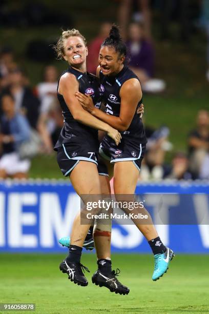 Katie Loynes of the Blues celebrates with Darcy Vescio of the Blues after scoring a goal during the round 20 AFLW match between the Greater Western...