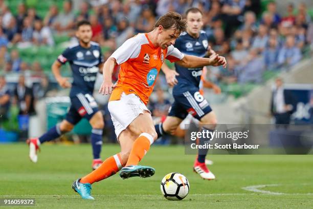Brett Holman of the Roar controls the ball before shooting and scoring the Roars second goal during the round 20 A-League match between the Melbourne...