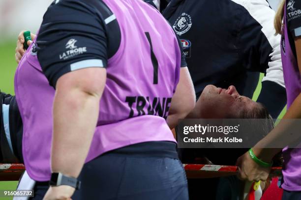 Brianna Davey of the Blues is stretchered from the field during the round 20 AFLW match between the Greater Western Sydney Giants and the Carlton...