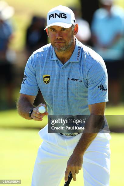 Lee Westwood of England acknowledges the gallery after a birdie during day two of the World Super 6 at Lake Karrinyup Country Club on February 9,...