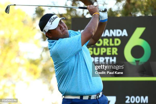 Prom Meesawat of Thailand watches his tee shot on the 17th hole during day two of the World Super 6 at Lake Karrinyup Country Club on February 9,...