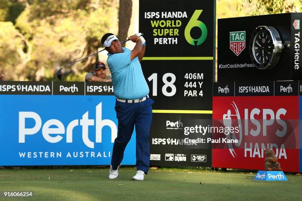 Prom Meesawat of Thailand watches his tee shot on the 18th hole during day two of the World Super 6 at Lake Karrinyup Country Club on February 9,...