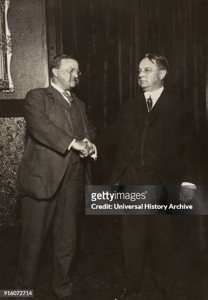 Theodore Roosevelt and Hiram Johnson, full-length Portrait Shaking Hands after being nominated as Presidential and Vice Presidential Candidates for...