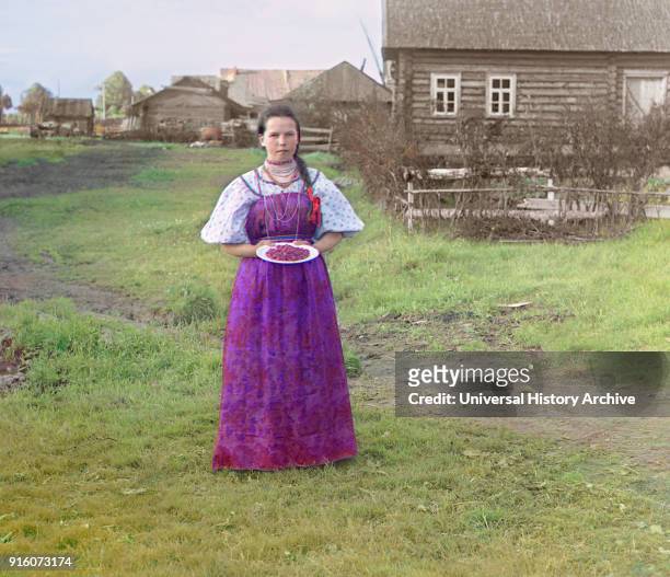 Peasant Girl with Berries, near Kirillov, Russia, Prokudin-Gorskii Collection, 1909 .