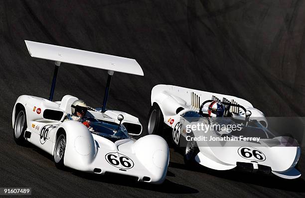 Jim Hall drives his Chaparral 2E ahead of Gil de Ferran the Chaparral during a demonstration lap before practice for the ALMS Monterey Sports Car...