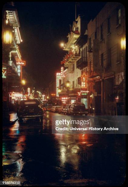 Street Scene on Rainy Night, Chinatown, San Francisco, California, USA.