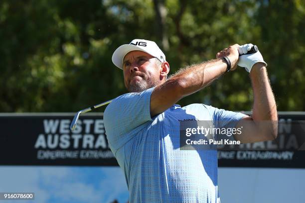 Lee Westwood of England watches his tee shot on the 17th hole during day two of the World Super 6 at Lake Karrinyup Country Club on February 9, 2018...