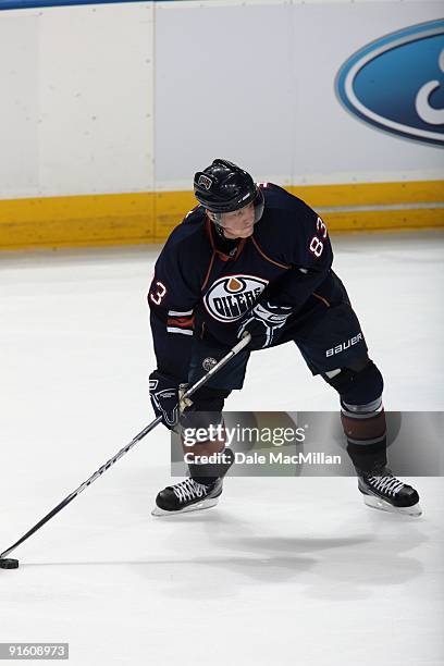 Ales Hemsky of the Edmonton Oilers handles the puck against the Calgary Flames on September 23, 2009 at Rexall Place in Edmonton, Alberta, Canada.