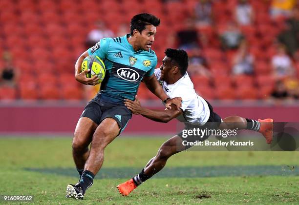 Trent Renata of the Hurricanes attempts to break away from the defence during the 2018 Global Tens match between the Hurricanes and Fiji at Suncorp...