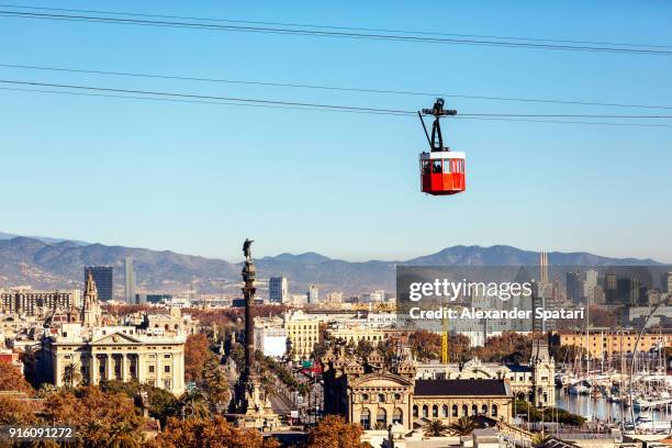 barcelona high angle view skyline with and red cable car - barcelona stockfoto's en -beelden