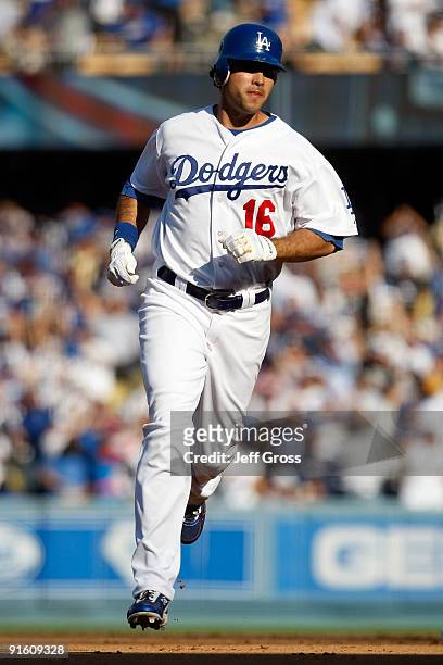 Andre Ethier of the Los Angeles Dodgers rounds the bases after he hits a solo home run to center in the fourth inning against the St. Louis Cardinals...