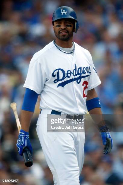 Matt Kemp of the Los Angeles Dodgers reacts after striking out in the fourth inning against the St. Louis Cardinals in Game Two of the NLDS during...